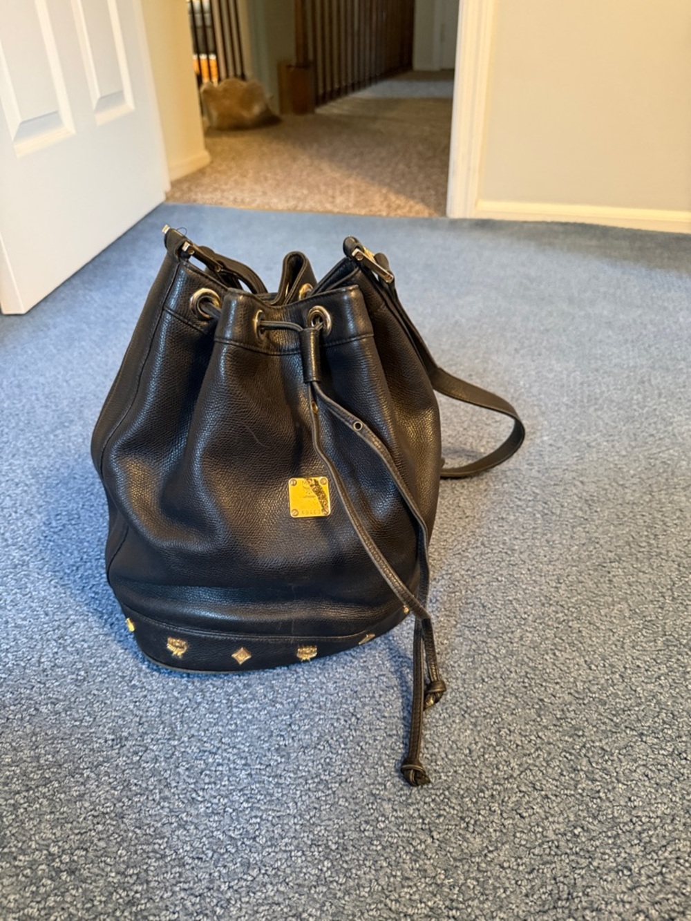 MCM Black Leather Drawstring Bucket Bag with Gold Hardware